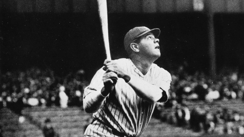 Babe Ruth holding baseball bat