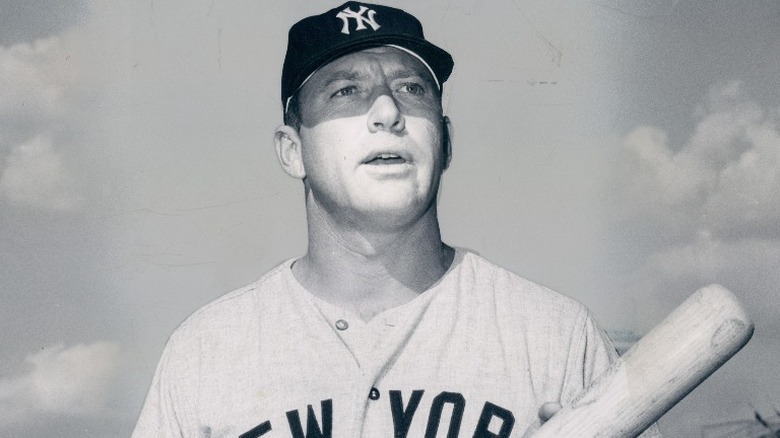 Mickey Mantle holding baseball bat