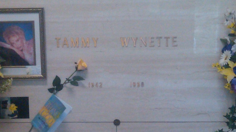 Tammy Wynette's crypt with flowers and photo
