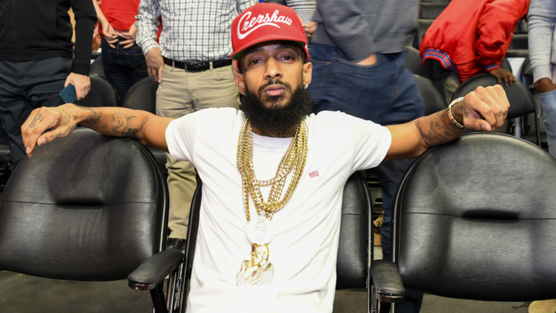 Nipsey Hussle at a basketball game
