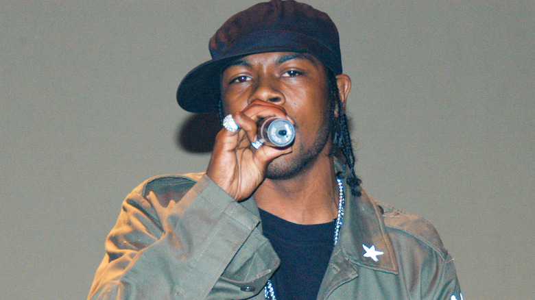 Static Major rapping into microphone