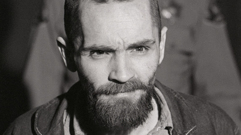 Charles Manson with shaved head and goatee