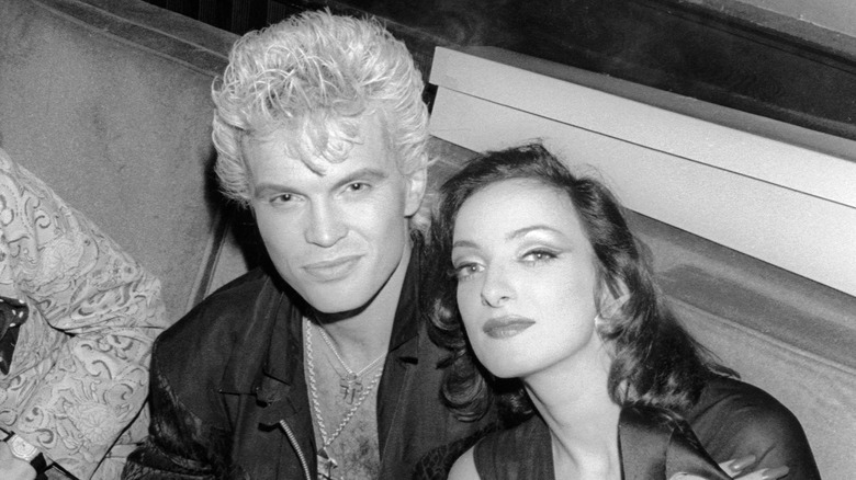 Billy Idol and Perri Lister sitting