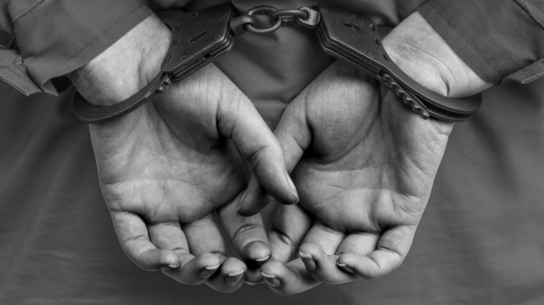 A person in handcuffs