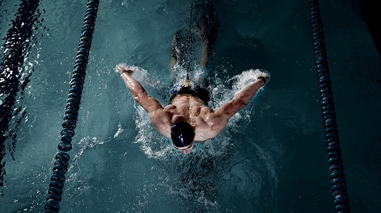 Athlete swimming in pool