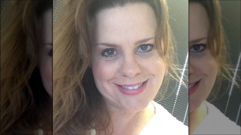 Rebecca Sneed Menendez smiling
