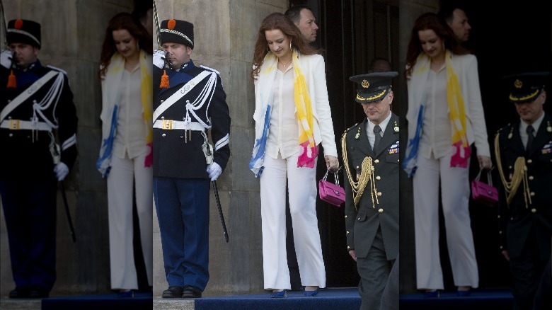 lalla salma formal clothing walking down steps