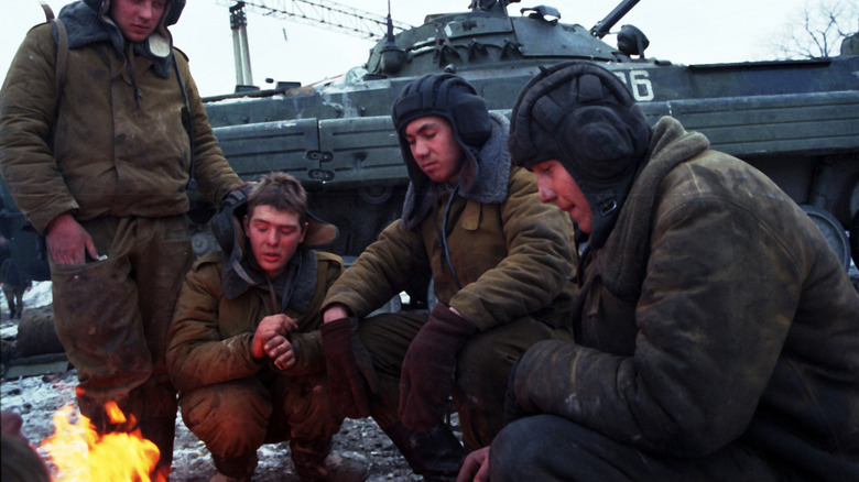Russian soldiers around campfire