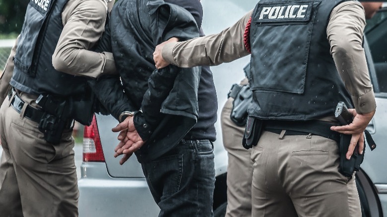 man arrested, handcuffs