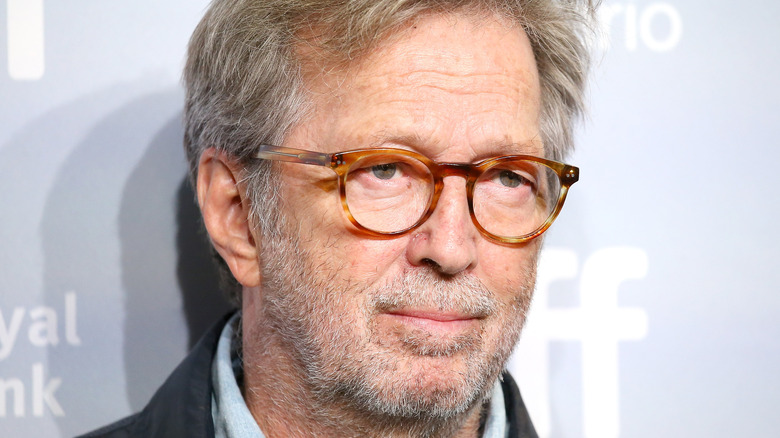 Eric Clapton wearing brown glasses