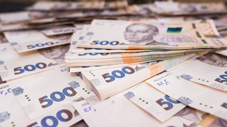 Ukrainian money piled up