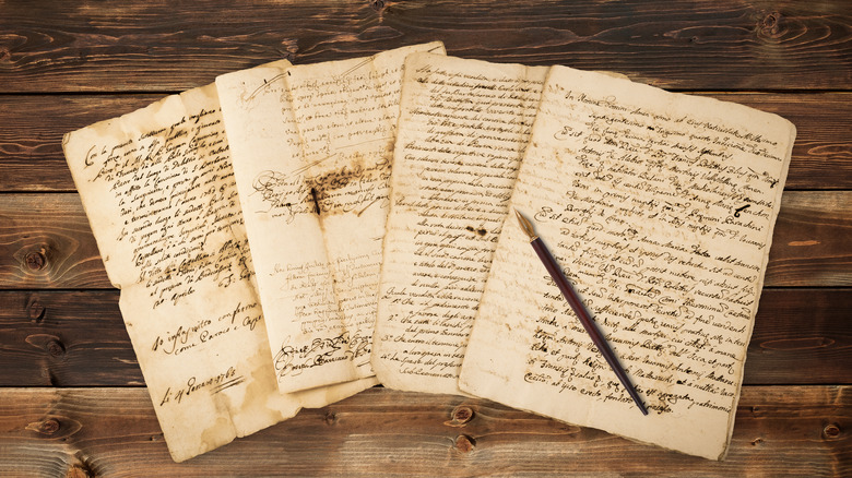 Old manuscript and pen