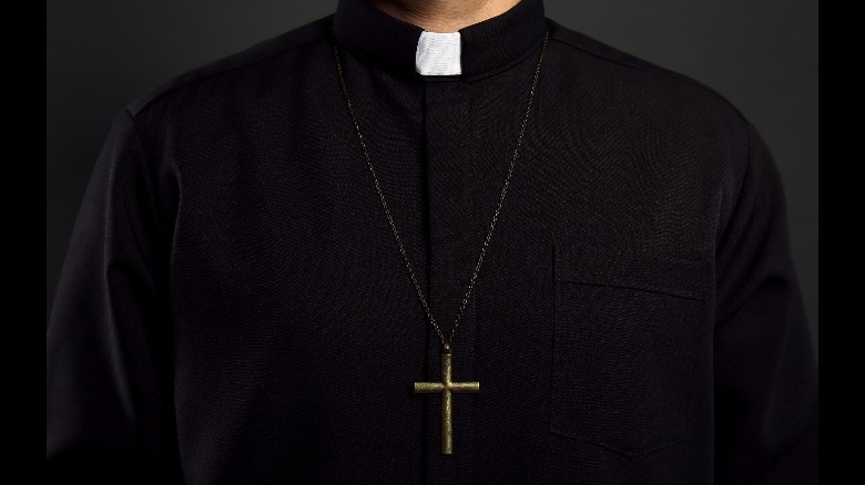 priest standing