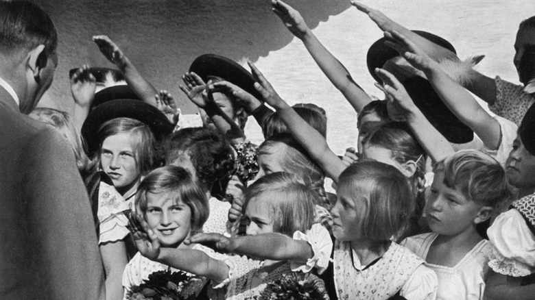 children saluting Adolf Hitler 