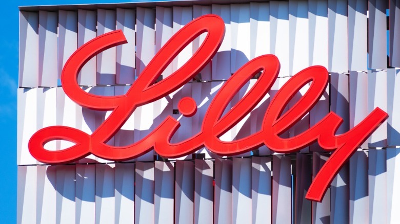Red Lilly company logo on building