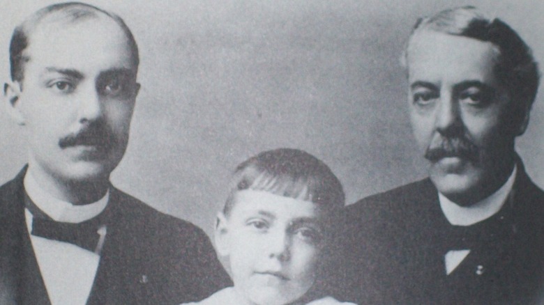 Josiah, Eli Lilly Jr., and Eli Lilly Sr., sitting together neutral suited
