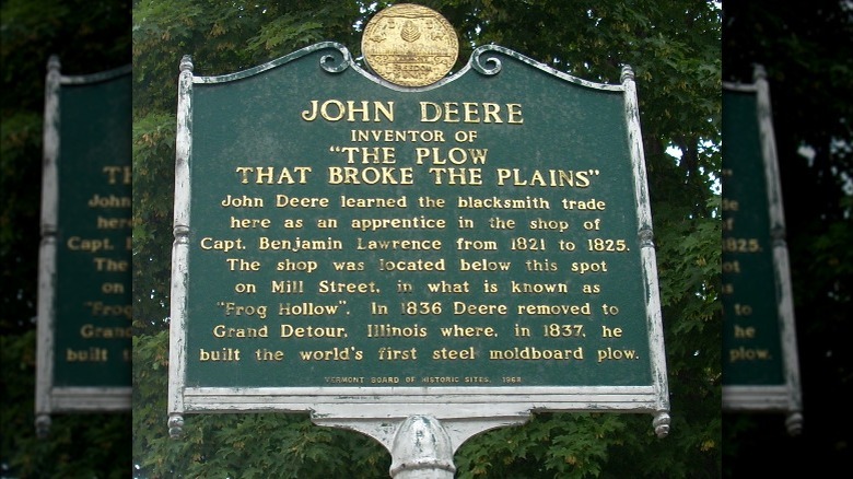 A historical marker marking the start of John Deere's career, located in Middlebury, Vermont