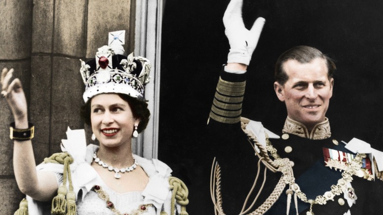 Queen Elizabeth II and the Duke of Edinburgh waving