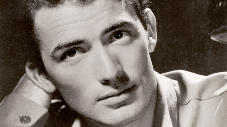 Gregory Peck with head on arm