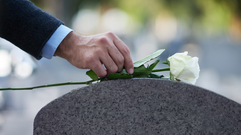 Hand flower on grave