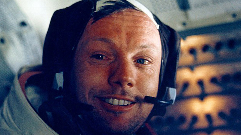 Neil Armstrong smiling in lunar module