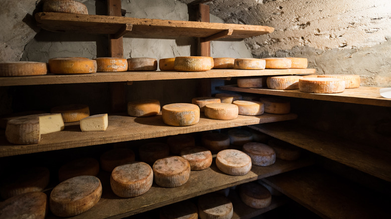 cheese aging in a cave