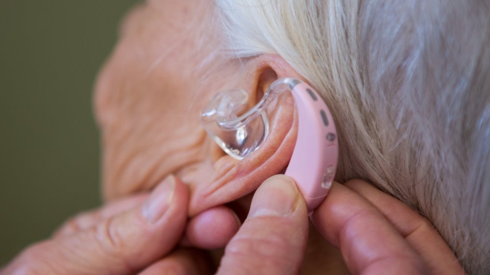 hearing aid elderly woman