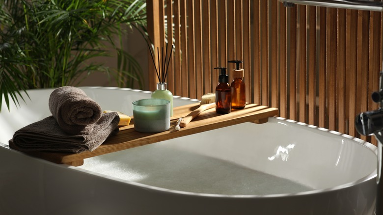 Bathtub full of water and bubbles