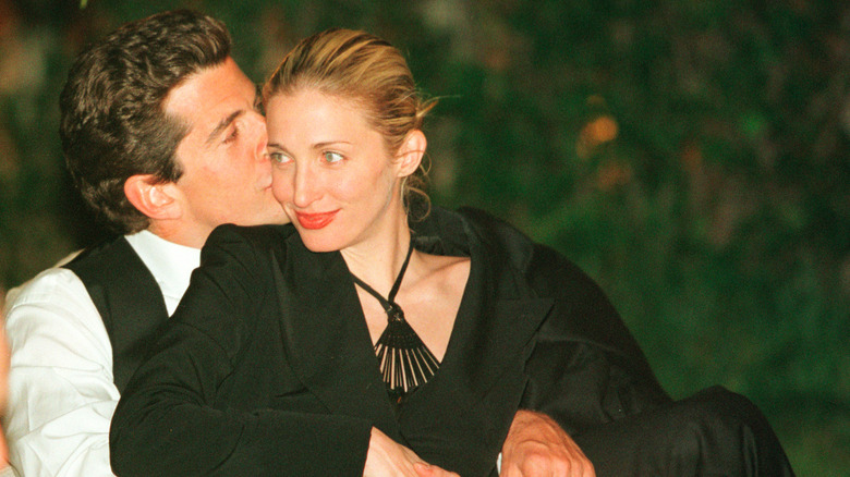 John F. Kennedy Jr. kissing Carolyn bessette