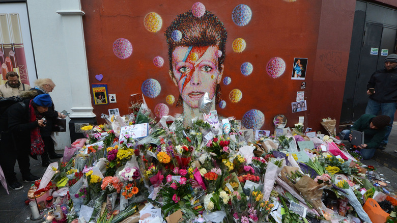 A mural and street memorial for David Bowie in South London, shortly after his death.