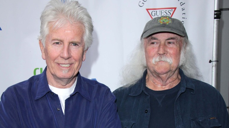 Graham Nash and David Crosby posing