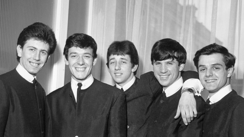The Hollies smiling
