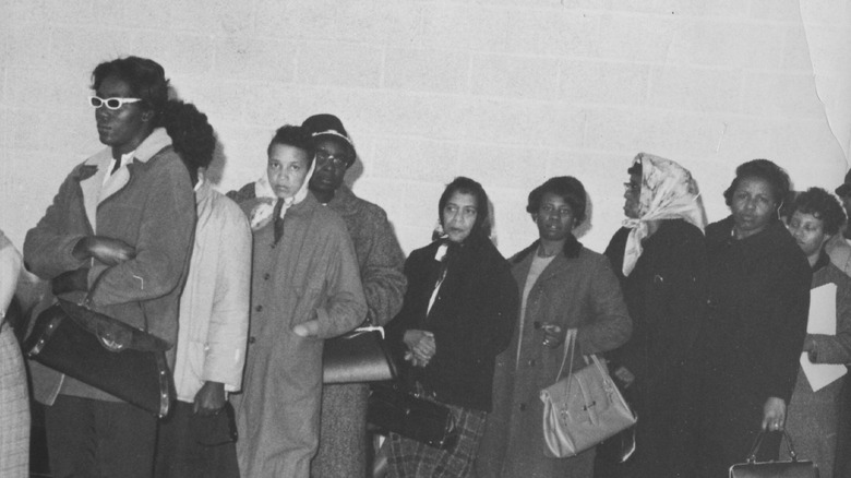 A line of Black women waiting to vote in 1964