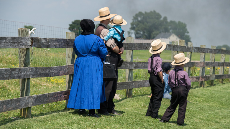 Amish people in traditional attire