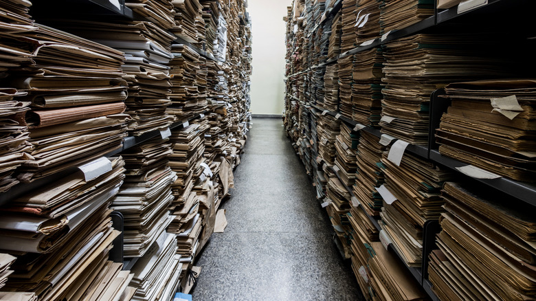 Long hallway filled with files 