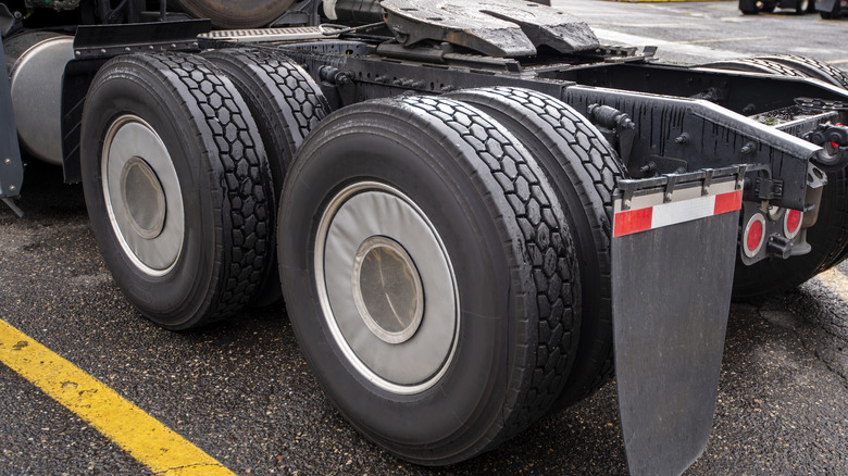 Mud flaps on the rear wheels of a truck