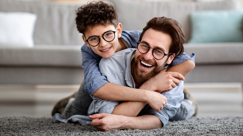Father and child hugging