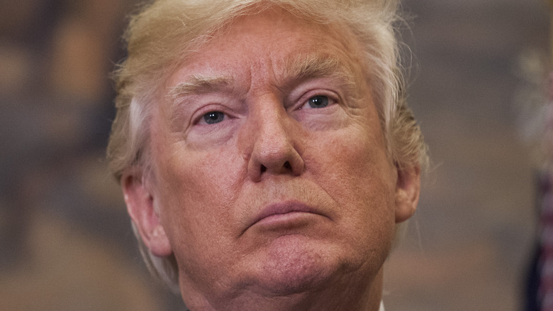 donald trump in red tie