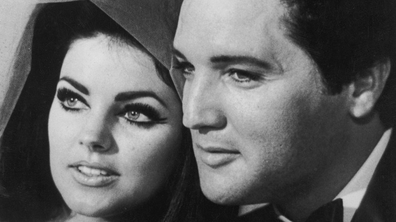 Priscilla and Elvis Presley smiling together