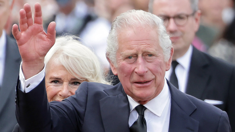 King Charles III waving