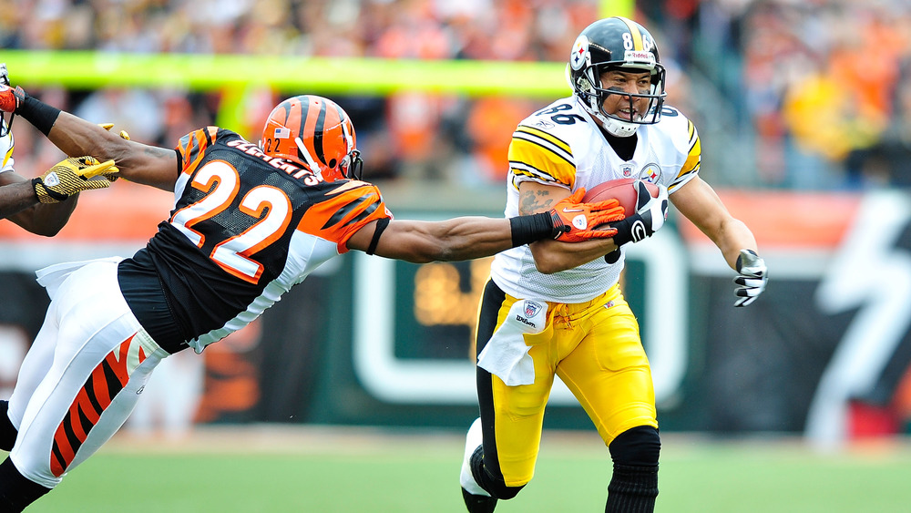 Hines Ward running with football