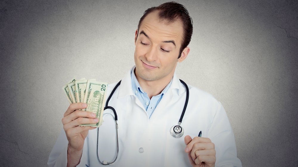Doctor with money