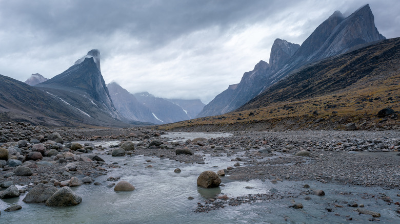 Baffin Island view across cliffs with Mount Thor in distance