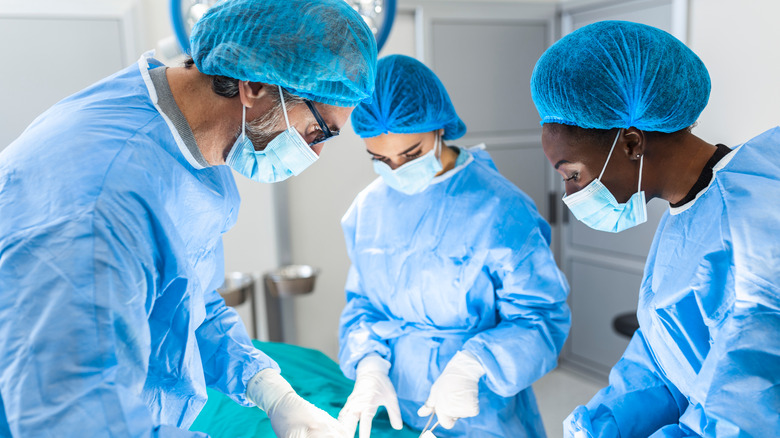 Doctors performing surgery