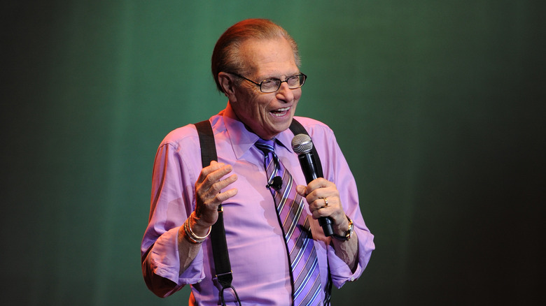 Larry King purple shirt
