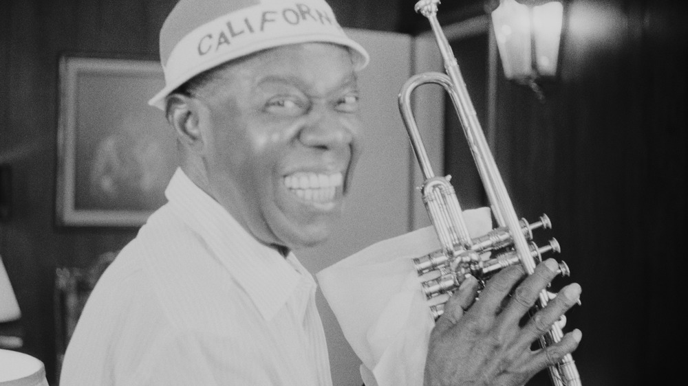 Jazz musician Louis Armstrong with a trumpet