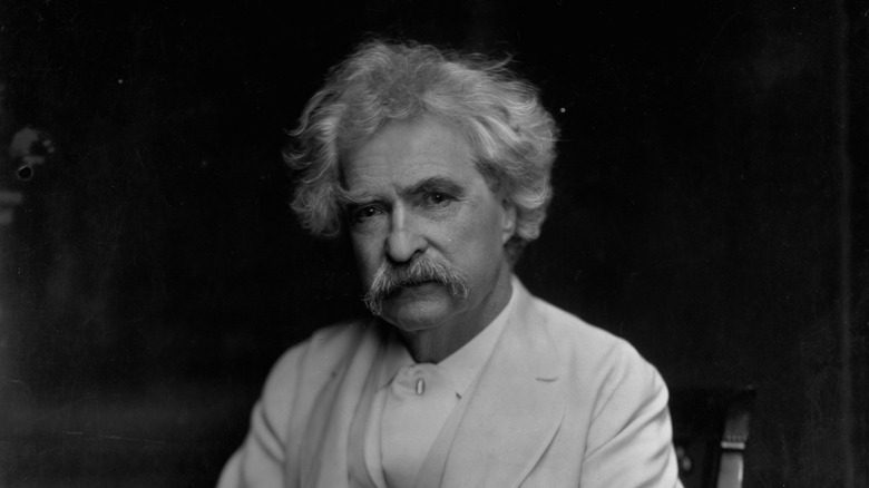 Mark Twain in white suit