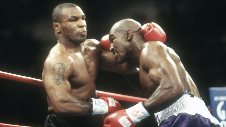 Mike Tyson and Evander Holyfield boxing