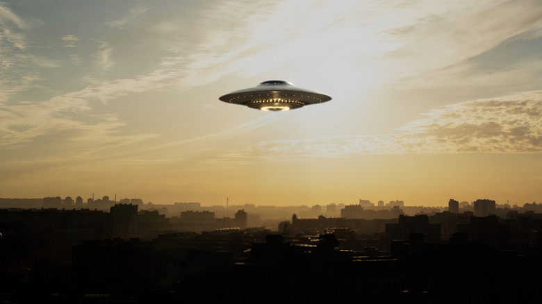 UFO flying over city