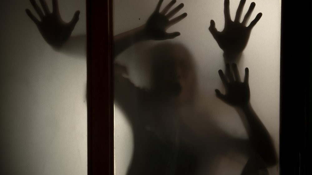 A tock image of ghostly silhouettes 
